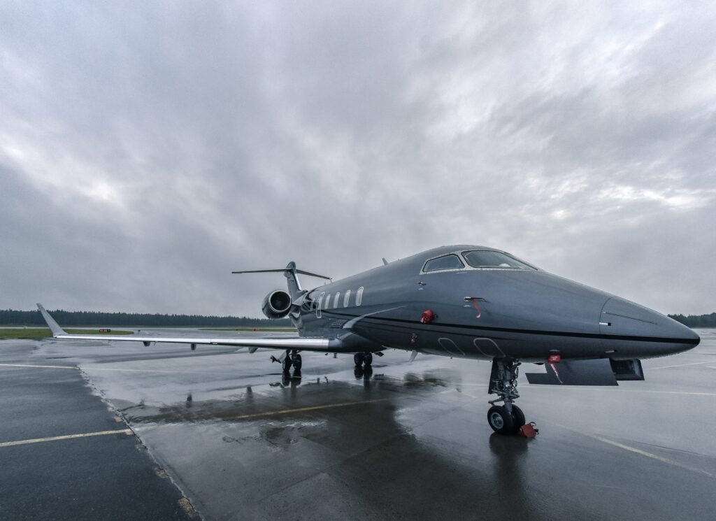 Black private jet showcasing its sleek design and luxury features.