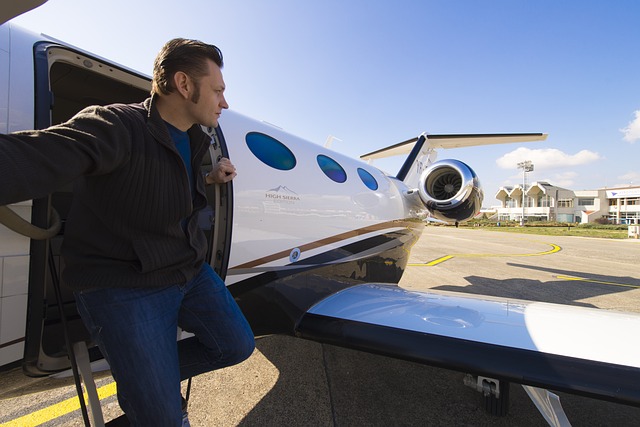 Man stepping off a private jet, exuding elegance and sophistication.