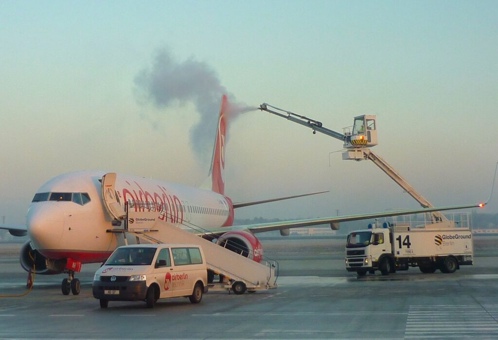 Private jet undergoing a detailed safety inspection.