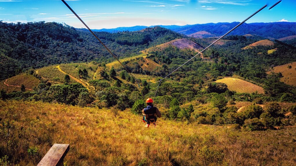 Man enjoying an exhilarating zipline ride.