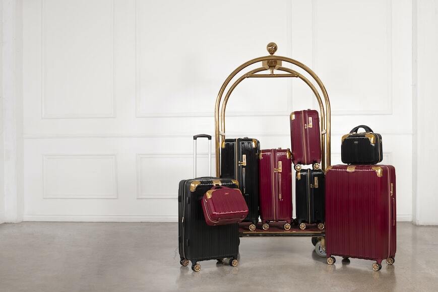 Luggage stacked neatly on a trolley, ready for travel.