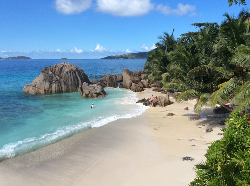 Stunning panoramic view of the pristine beaches and lush tropical landscape of Seychelles.